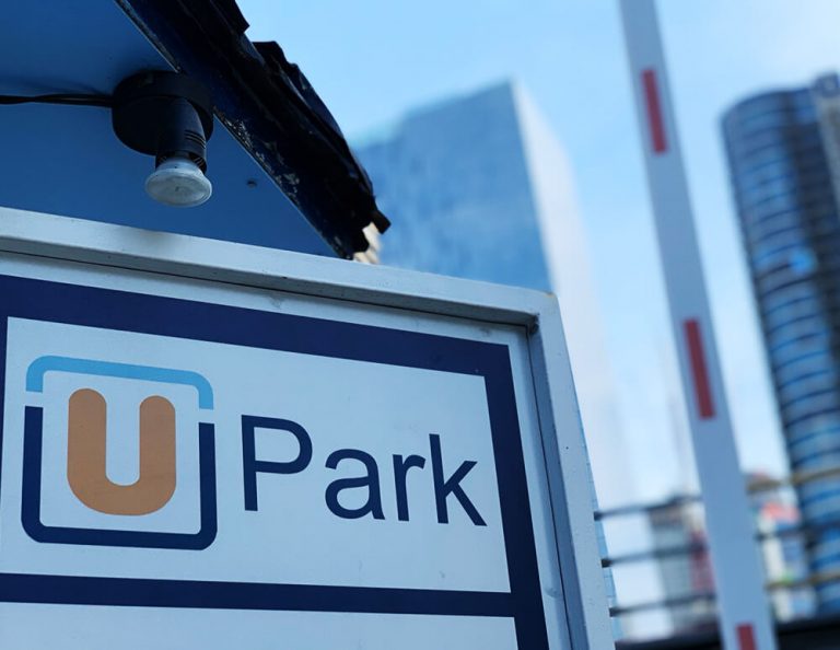 UPark logo signage with light