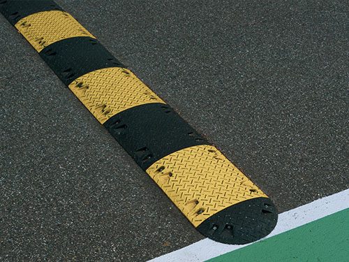 Black and yellow speed bumps