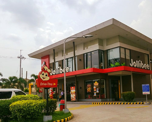 Infront of Jollibee Antipolo branch drive-thru signage