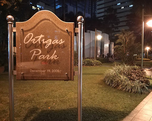 Signage of Ortigas Park entrance at night