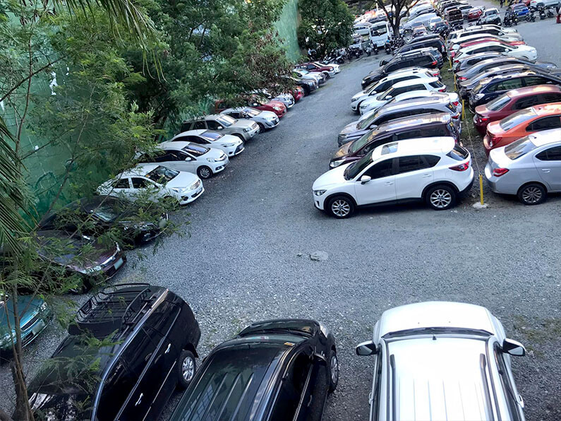 Top view of car and motorcycle parking area along Sapphire Road in Ortigas City