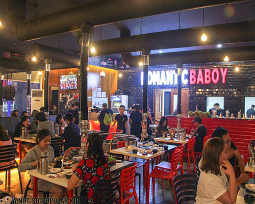 Inside Romantic Baboy packed with customers and busy employees