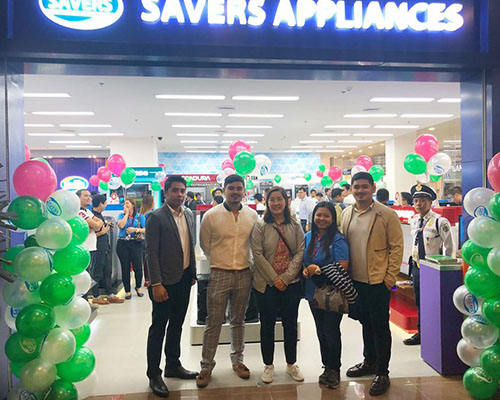 People photographed standing at the entrance of Savers Appliances Antipolo