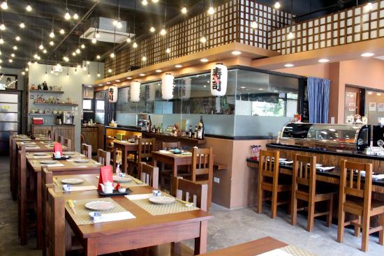 Inside an empty Shinsen Sushi and Bar branch with japanese interior