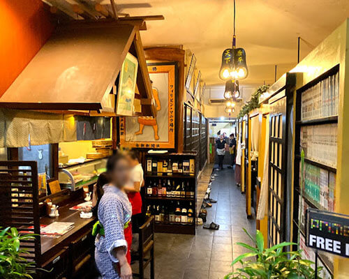 The interior of Sekitori Japanese Restaurant (faces of the employees on blur)