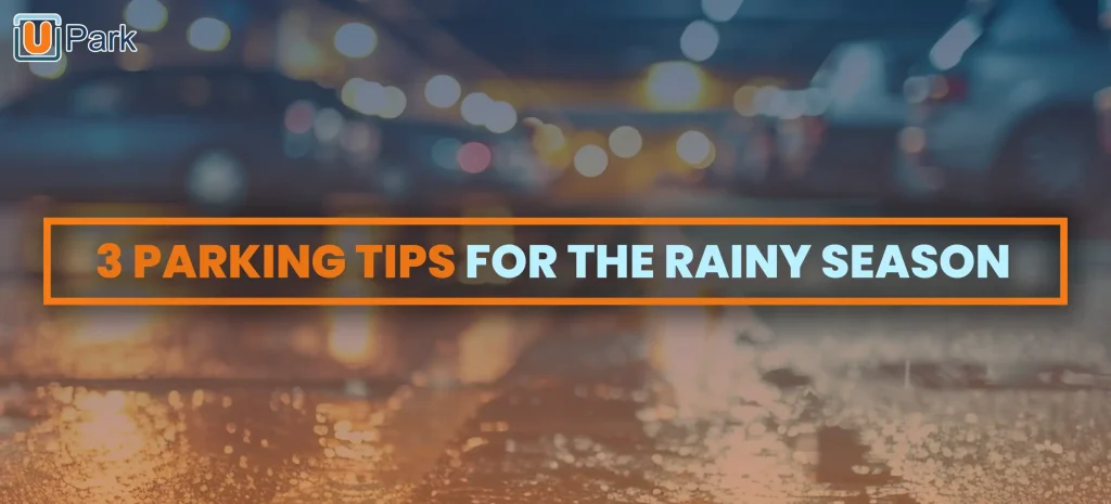 Blurred parking lot scene with wet pavement reflecting lights suggesting rainy weather with text overlay 3 Parking Tips for the Rainy Season and UPark logo in corner representing promotional graphic for safe parking advice